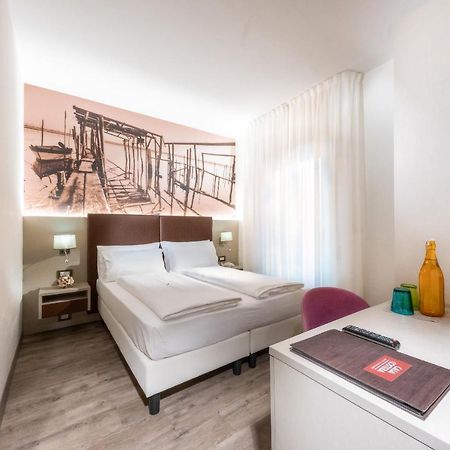 Hotel Casa Costiera Каорле Экстерьер фото