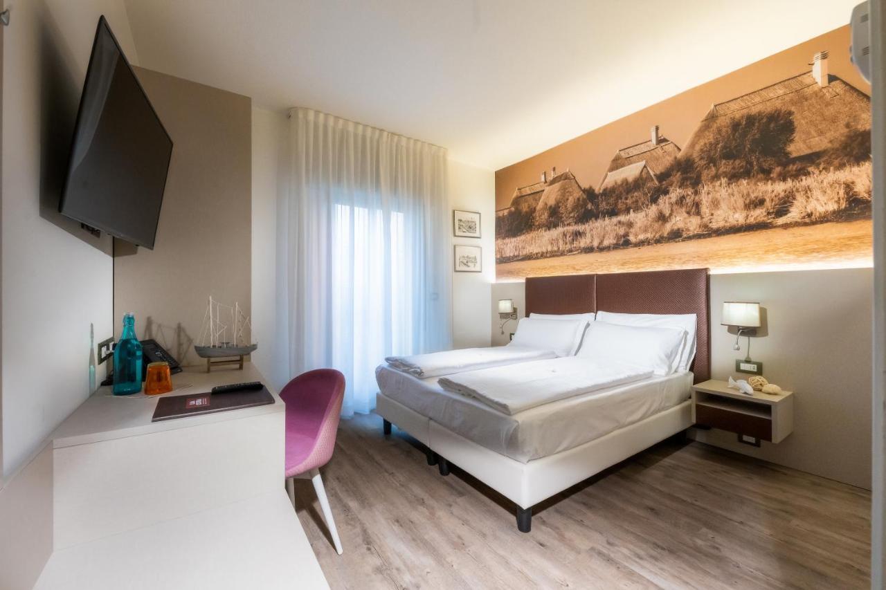 Hotel Casa Costiera Каорле Экстерьер фото