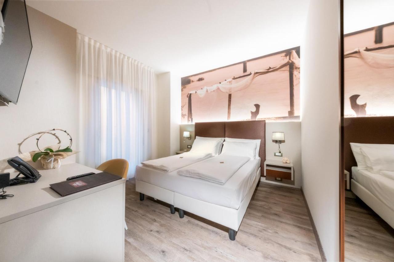 Hotel Casa Costiera Каорле Экстерьер фото